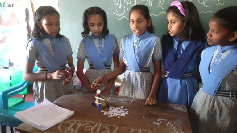 Students demonstrating robotics projects